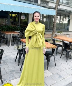 Áo dài thiết kế cách điệu nơ bản lớn màu xanh mạ mã T167 Hoàng Cẩm Chi